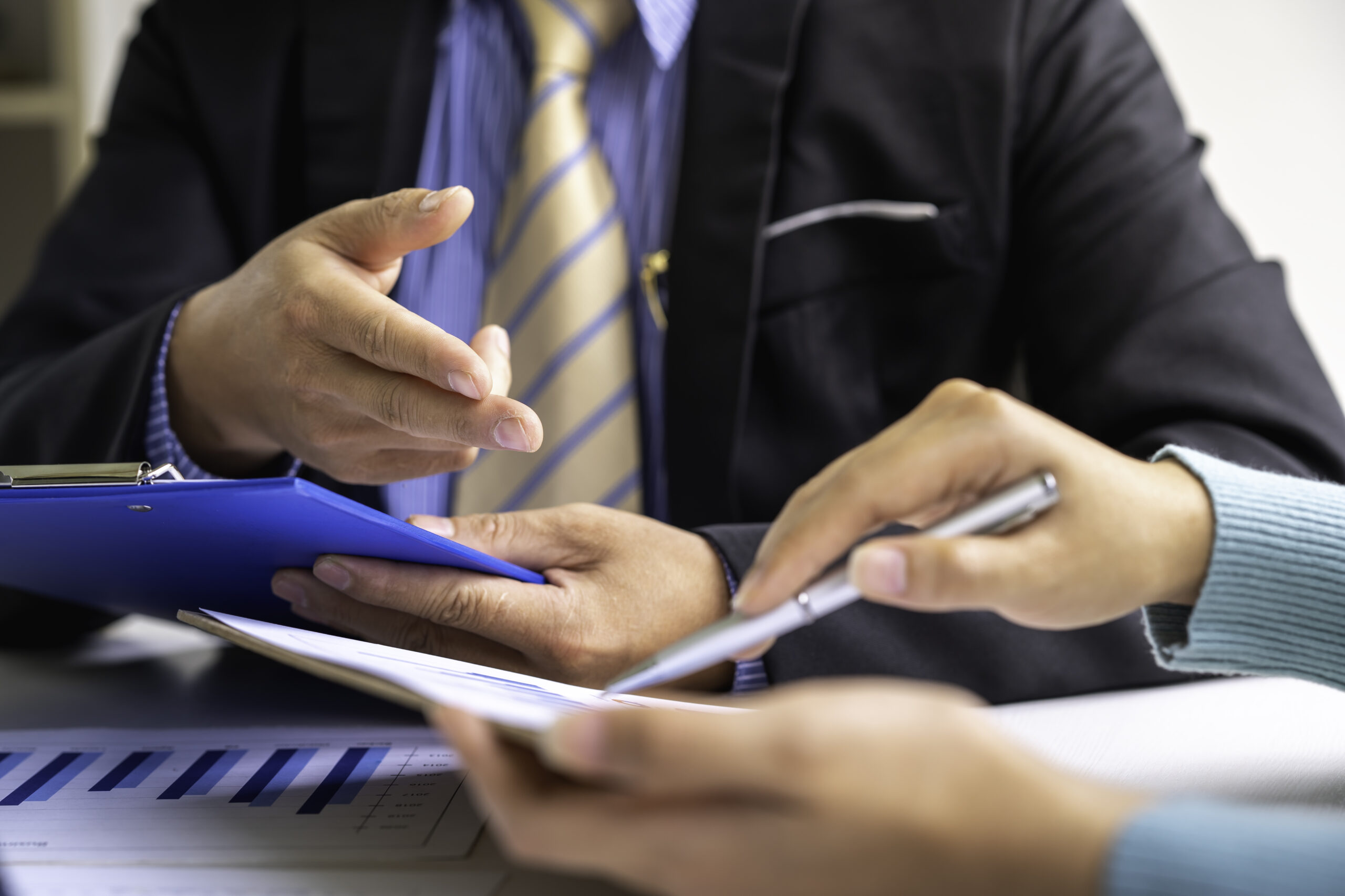 Financial advisor teamwork and accounting concept, Business People Meeting to analyze and discuss and brainstorming the financial report chart data in the office